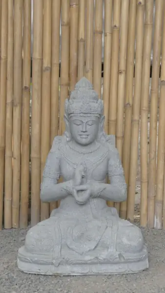 Product image of the product “Seated Dewi Sri, position chakra turning the wheel, 79,5 cm high riverstone grey, modell with sativa ”